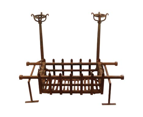 A wrought iron dog grate, 76 cm x 41 cm x 58 cm