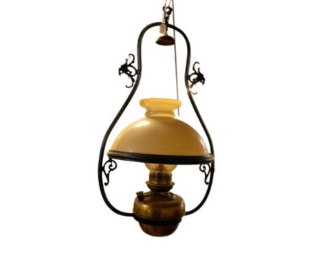 A "Lampe National" hanging harp oil lamp, in cast iron and brass, with a glass shade, height 74 cm