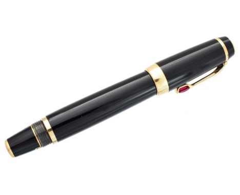 Montblanc, Boheme, a black fountain pen, the cap with a synthetic ruby set clip and cap band, the retractable nib stamped 14K