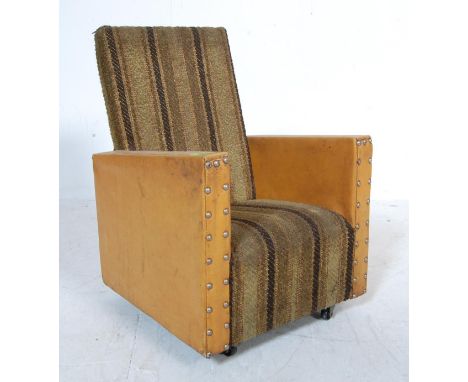 An early 20th century circa 1930’s Art Deco children armchair / club chair having high backrest upholstered with in striped f