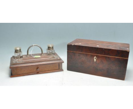 A late 19th century Victorian burr walnut tea caddy. The tea caddy of a rectangular form with hinged lid and diamond shape bo