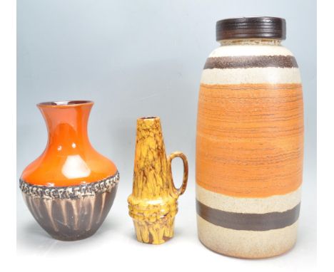 A collection of retro vintage studio West German earthenware pottery comprising of three vases / ewers. The collection includ