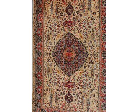 A late 19th century / early 20th century Persian Islamic carpet rug. The rug being decorated with multicolour animals and bir