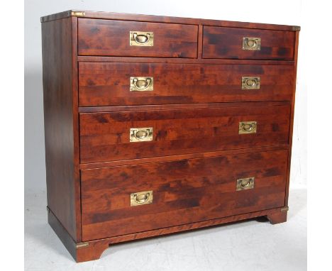 A late 20th century mahogany campaign chest of drawers by Laura Ashley. The chest of drawers having two short drawers over th