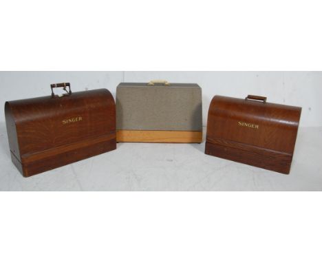 A collection of three vintage 20th century sewing machines comprising of a vintage No 66 Singer sewing machine model number Y