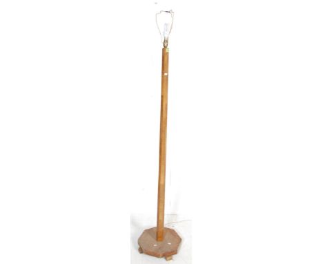 An early 20th century 1930s Art Deco standard lamp of tapering form raised on a hexagonal base. Measures. 180cm high