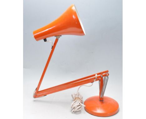 A vintage retro 20th century Herbert Terry anglepoise desk lamp / light. The lamp having a conical shade with articulated arm