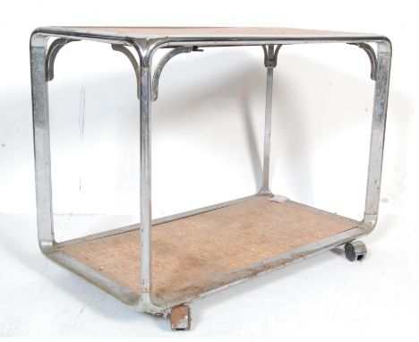 A retro vintage industrial late 20th century drinks / serving trolley having two melamine topped tiers set within a chrome fr