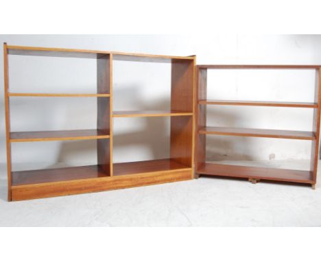 Two vintage retro 20th century teak wood Danish inspired opened back bookcases. The bookcases of a rectangular form raised on