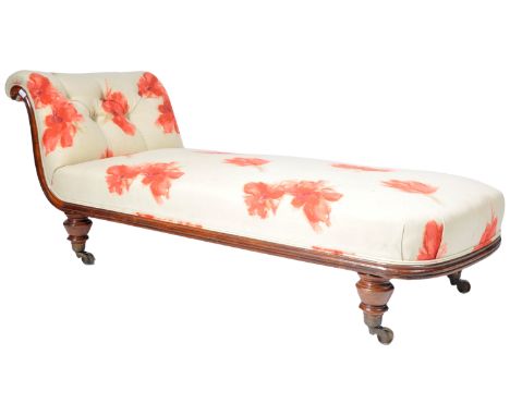 An antique late 19th Century Victorian English mahogany&nbsp;chaise lounge / daybed having a scroll button back head / backre