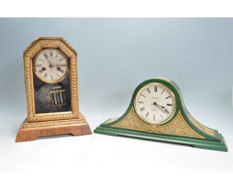 A vintage 20th century Regency style 8 day mantel clock decorated in a green colourway with botanical embellishments together