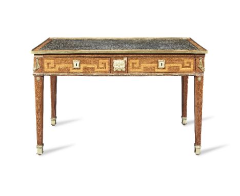 A late Louis XV ormolu mounted amaranth and tulipwood inlaid bureau plat attributed to Philippe-Claude Montigny (1734-1800)Ci