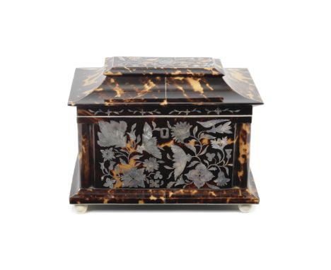 A good early Victorian tortoiseshell mother of pearl inlaid tea caddy Of rectangular form with white metal stringing and shal