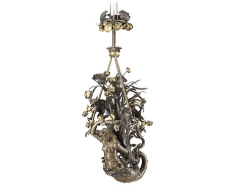 An unusual late 19th century bronze and patinated and gilt metal nine light mermaid chandelierProbably FrenchThe semi-clad ma