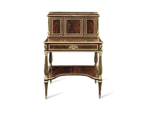 A French late 19th century ormolu mounted flame figured mahogany bonheur du jour in the Louis XVI styleCirca 1880, after the 