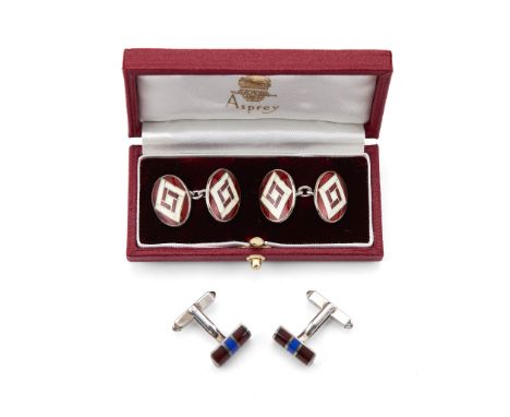  Asprey, a pair of silver and enamel double sided cufflinks,   London 1995,  the red and white guilloche enamel oval panels w