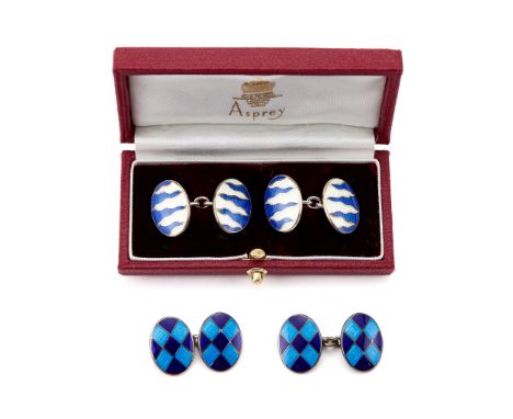  Asprey, a pair of silver and enamel double sided cufflinks,   London 1995,  the blue and white guilloche enamel oval panels 