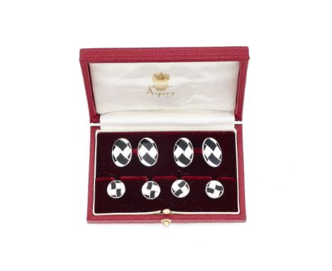  A pair of silver and enamel cufflinks and four dress studs,   retailed by Asprey, the double sided cufflinks with oval panel