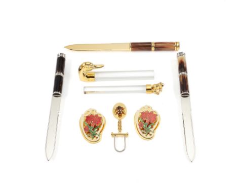  A collection of desk accessories,   to include: three letter openers, with horn handles, two with electro-plated blades and 