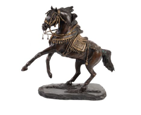 δ  Annette Yarrow (British b. 1932), a patinated and gilt finished bronze horse, modelled as a rearing Arab stallion, on a sl