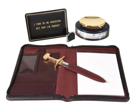  Asprey, a letter opener,   in the form of a dagger, with a leather sheath, in an Asprey box; an Asprey measuring tape; a set