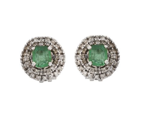 Vintage Oval Cut Emerald, Diamond and 18 Karat White Gold Earrings. Emeralds measure approx. 6.2 x 6.8mm each. Diamonds G-H c