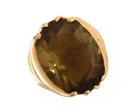 Vintage Oval Cut Topaz and 14 Karat Yellow Gold Ring. Citrine measures 20mm x 15MM. Stamped 14K, Ring size 6-1/4. Approx. wei