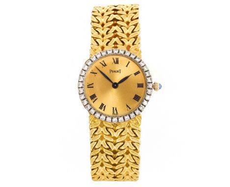 Lady's Vintage Piaget 18 Karat Yellow Gold Bracelet Watch with Diamond Bezel and Sapphire Crown, Manual Movement. Case measur