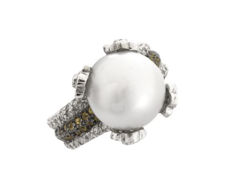 12.0mm South Sea Pearl, 1.17 Carat Diamond, .37 Carat Yellow Sapphire and 18 Karat White Gold Ring. Stamped 18K. Ring size 6-