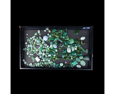 Multi piece lot of polished Jade stones. Unsigned. Various sizes. Provenance: Inventory of a Jewelry Manufacture Supplier. Co
