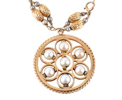 Delicate Vintage 14 Karat Yellow Gold and Pearl Bracelet with Charm. Stamped 14K to clasp. Charm measures 1-5/16" diam., brac