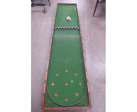A Victorian mahogany bagatelle board 