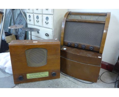 A portable Monarch record player and two vintage radios 