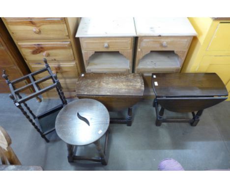 An oak barleytwist stick stand, two small drop leaf tables and another table 