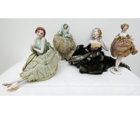 A group of four Art Deco pin cushion half dolls, three with bodies    one has hand broken off