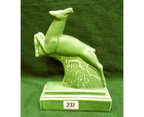 Poole Pottery model 'Leaping Gazelle' in green glaze, height 21cm   No sign of obvious damage or restoration 