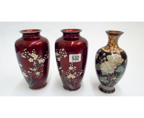 Pair of red enamel cloisonne vases approximately 9cm tall decorated with bows of cherry blossom and birds, together with anot