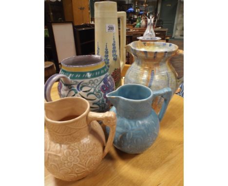 Poole Pottery jug, two Price jugs and two others 