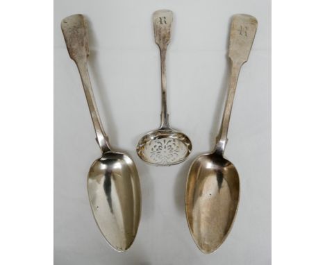 Two Georgian silver tablespoons London 1810 and a silver sifting spoon London 1854 all engraved initial R, 5.5ozs troy