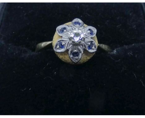 18ct yellow gold sapphire and diamond cluster ring, unusually set in a floral design in white gold on a yellow gold cushion p