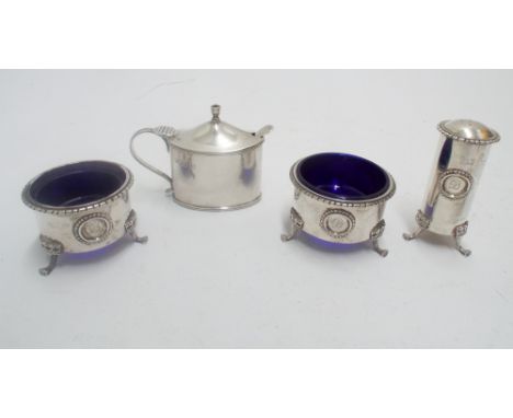 Three piece condiment set, salt and pepper, London Hallmarks 1947, together with an Edwardian silver mustard pot with spoon  