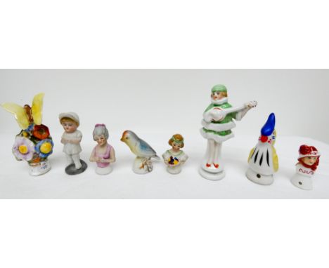 A group of eight miniature pin cushion half dolls   There is a chip on the Butterfly