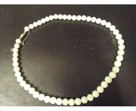 Long uniform row of pale jade beads, approx 45cm long