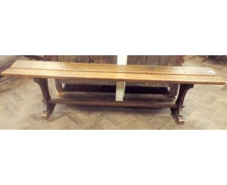 Long oak form bench on a refectory style base, approx 70" long 