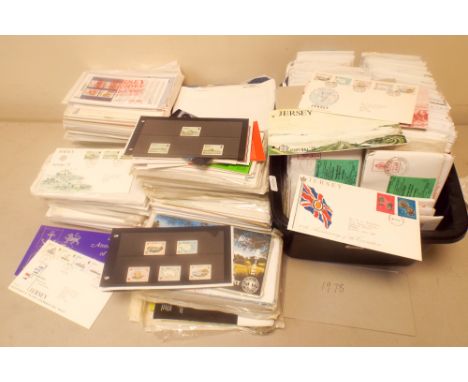 A very large accumulation of Jersey and Guernsey first day covers and mint stamps from the 1970's through to the 1990's 