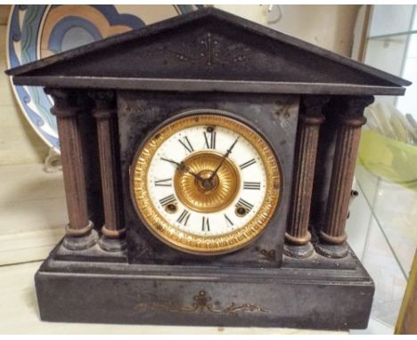 Late Victorian striking black marble mantel clock with Corinthian columns 