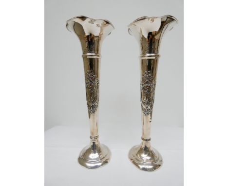 A tall pair of Edwardian silver specimen vases decorated with classical maiden playing a harp, Birmingham 1907 23cms tall