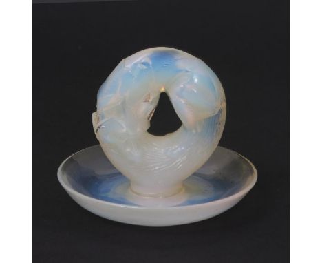  'Alaska' no.325 a Lalique opalescent glass cendrier designed by Rene Lalique, stencil R Lalique, 9.5cm. diam. Catalogue Note