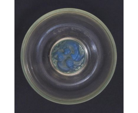  'Sirenes' no.277 a Lalique opalescent glass cendrier, with blue staining, R Lalique France no.277, 11.7cm. wide. Catalogue n