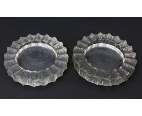  'Jamaique' no.296 two Lalique clear and frosted glass cendrier designed by Rene Lalique, one with black staining, etched R L